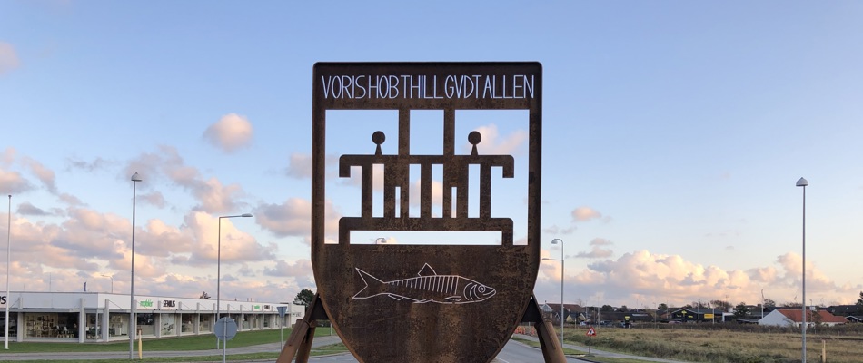 Våbenskjold med forskellige symboler med tilknytning til Skagen